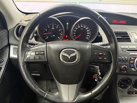 Mazda 3 1.6 AT (105 л.с.) 2010