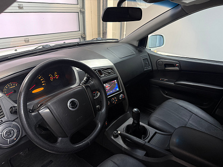 SsangYong Kyron 2.3 4WD MT (150 л.с.) 2013