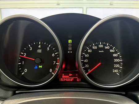 Mazda 3 1.6 AT (105 л.с.) 2010