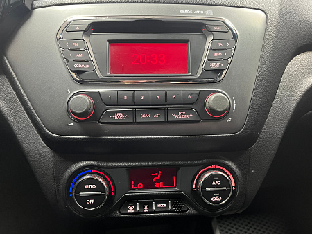 KIA Rio 1.6 AT (123 л.с.) 2013