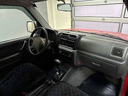 Suzuki Jimny 1.3 4WD AT (80 л.с.) 1999