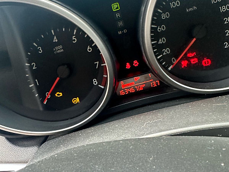 Mazda 3 1.6 AT (105 л.с.) 2010